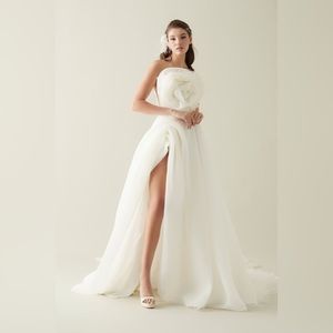 Custom design wedding gown only worn for photo shoots